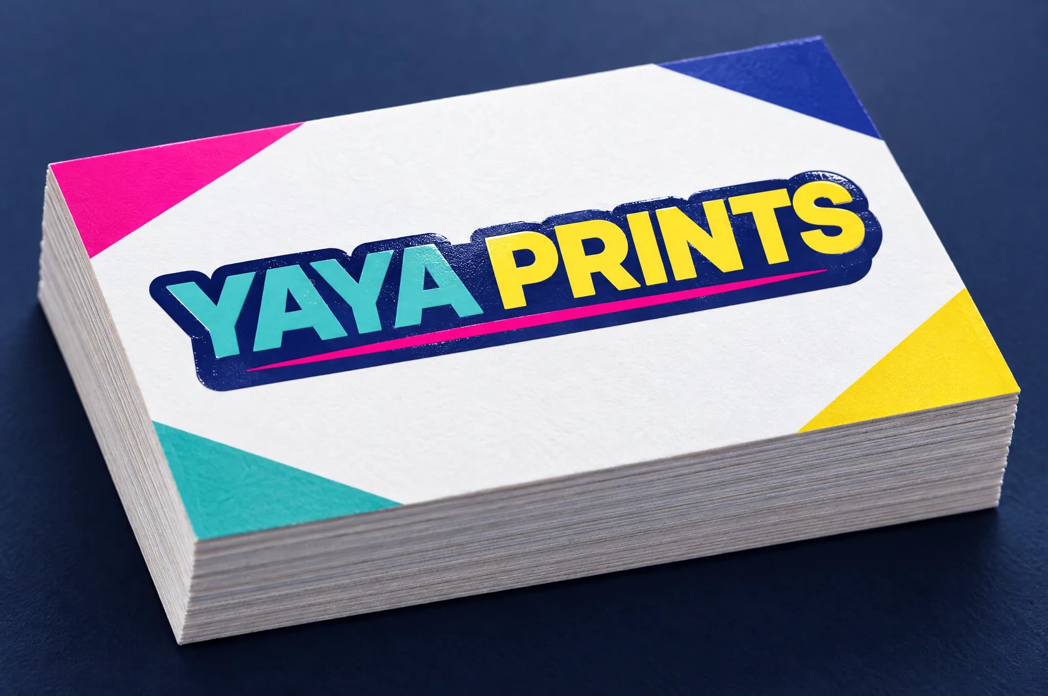 Close-up of a stack of thick business cards with a glossy spot-UV logo