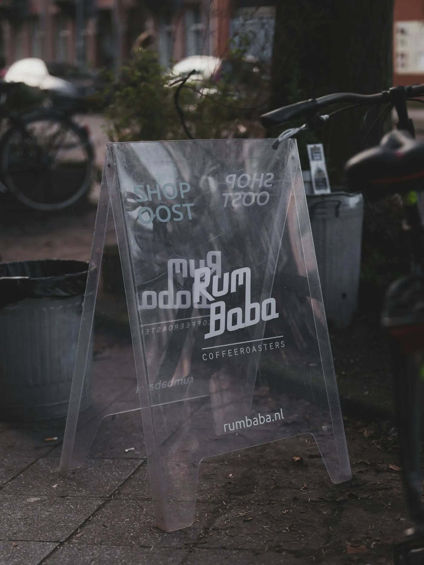 An A-frame sidewalk sign outside a shop