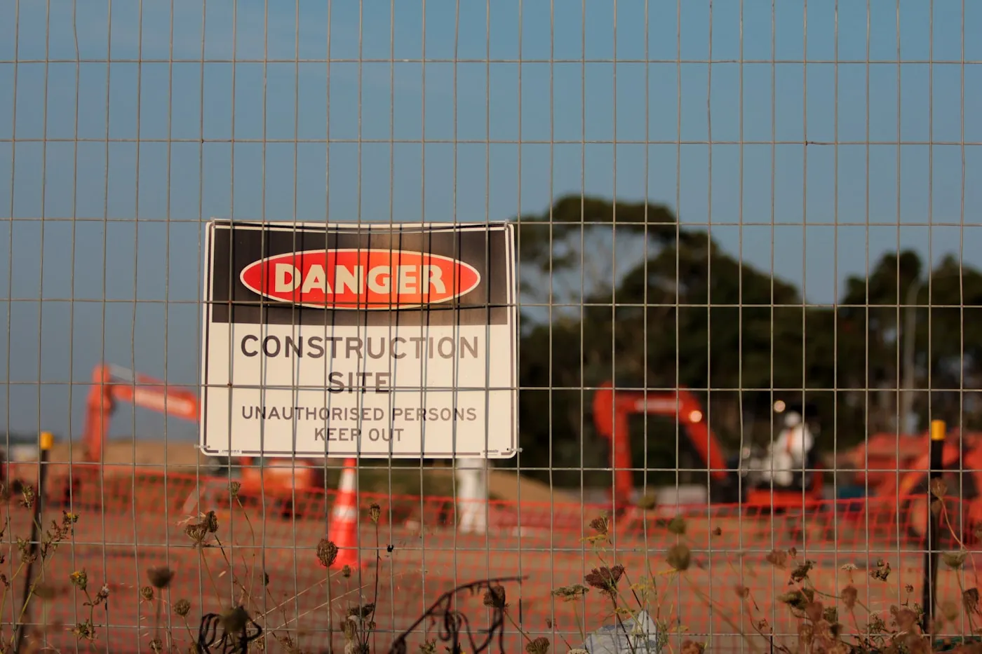 A construction site sign posted at a job site