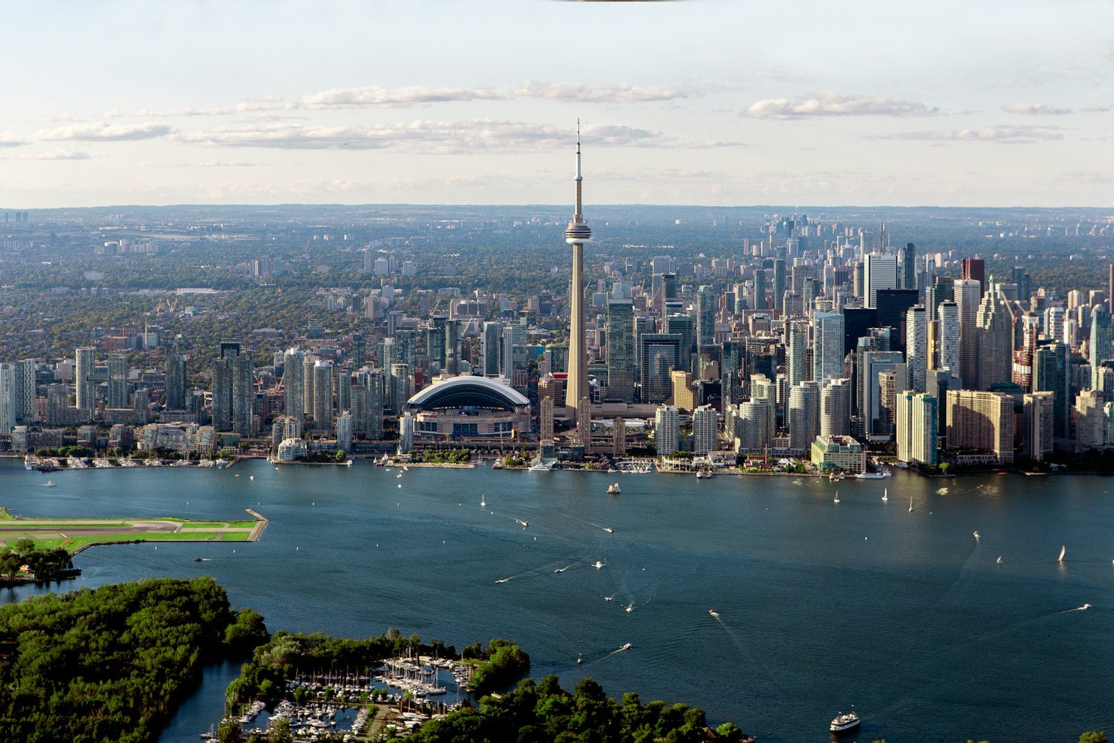 Aerial view of downtown Toronto, the CN Tower and the harbour, looking across the water from the Toronto Islands