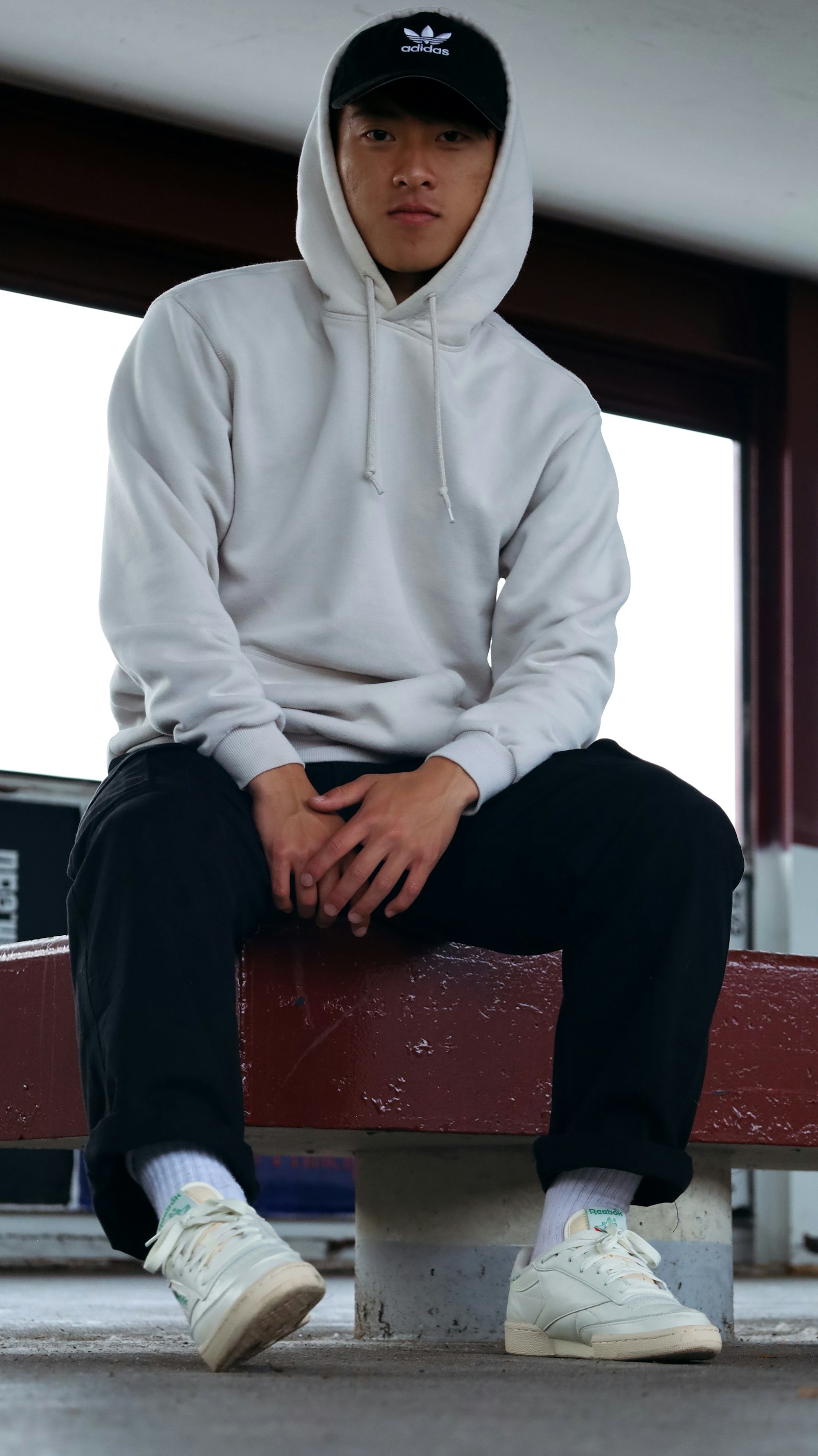 A person wearing a custom pullover hoodie