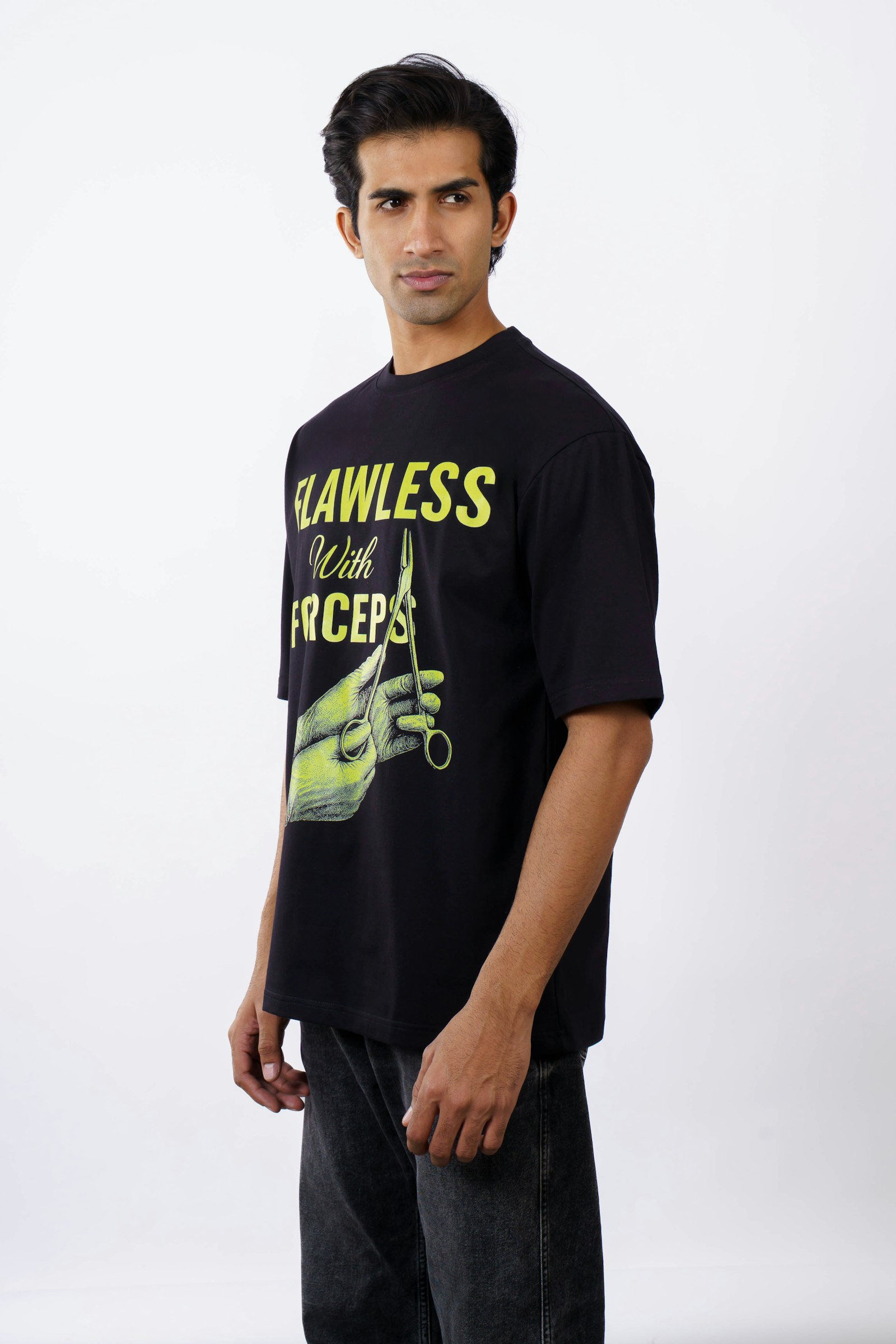 Close-up of printed lettering on a cotton t-shirt showing the edge of each character and the ink sitting on the fabric weave
