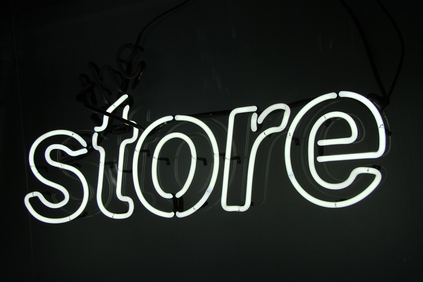 A glowing neon storefront sign